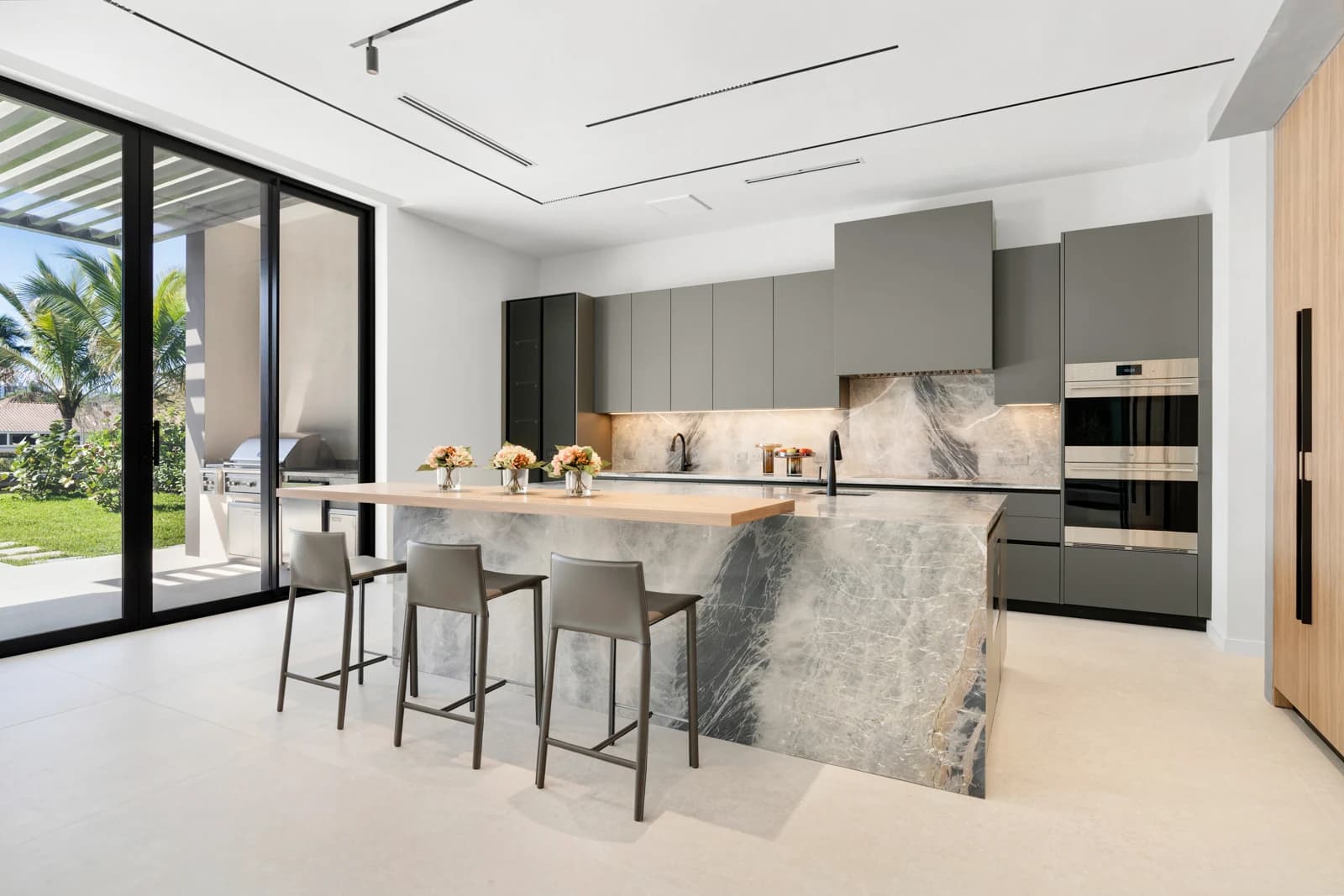 Kitchen island beside the terrace at 493 Holiday Drive
